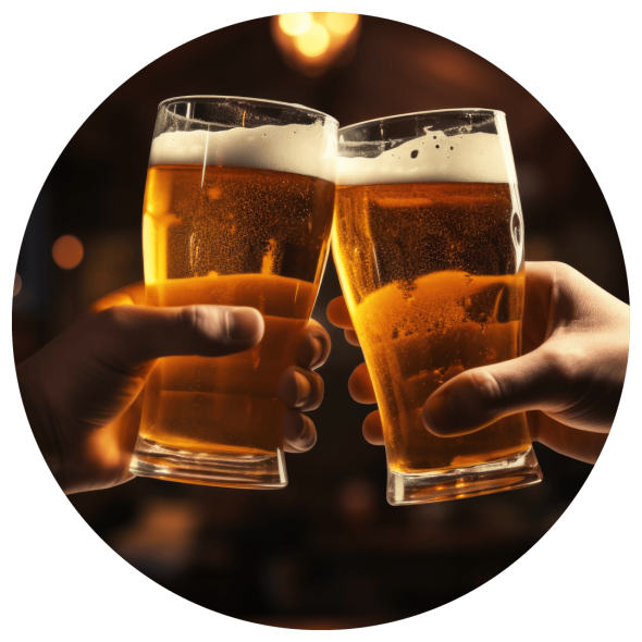 Two glasses of beer being brought together for a toast in golden light.